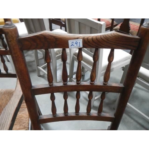 291 - A set of oak chairs with Raffia seats COLLECT ONLY.