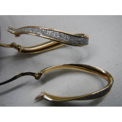 1044 - A superb quality pair of 9ct gold earrings.