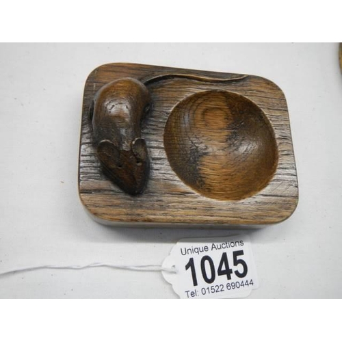 1045 - A Mouseman oak ashtray.