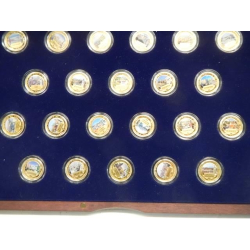 1057 - A limited edition cased set of 27 gold plated commemorative coins (Capitals of Europe).