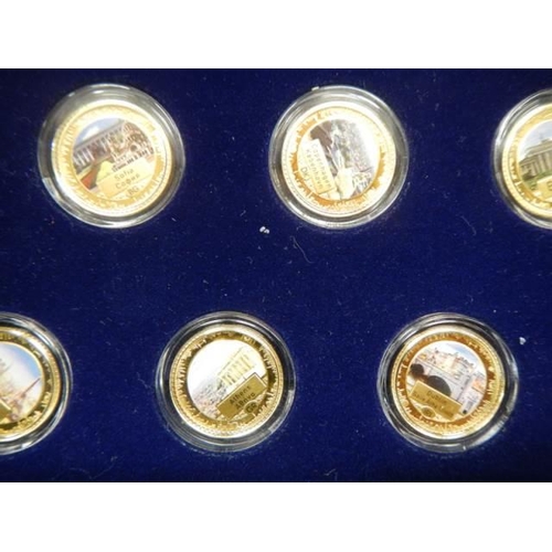 1057 - A limited edition cased set of 27 gold plated commemorative coins (Capitals of Europe).