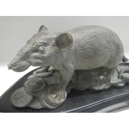 A 20th century bronze rat paperweight.
