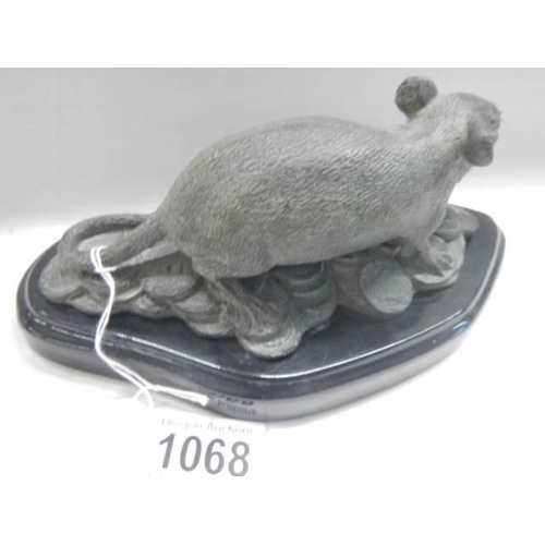 A 20th century bronze rat paperweight.