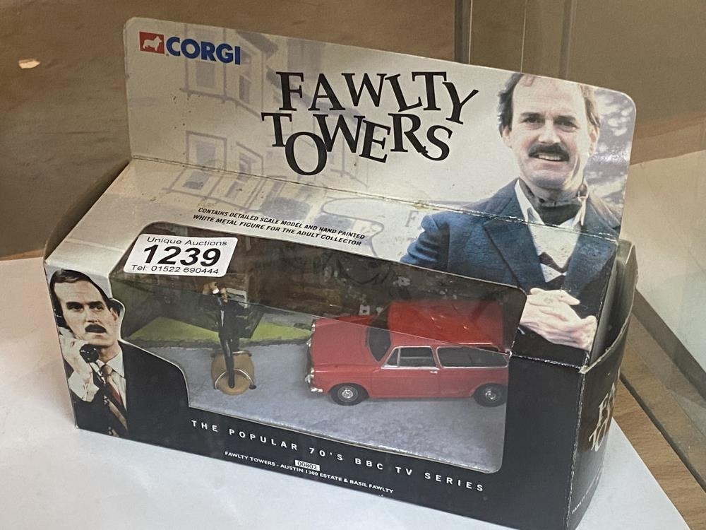 A boxed Fawlty Towers Austin 1300 estate and Basil Fawlty set no