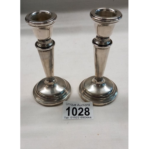 1028 - Pair of Birmingham silver 1978 candlesticks by Sanders and Mackenzie height 11cm