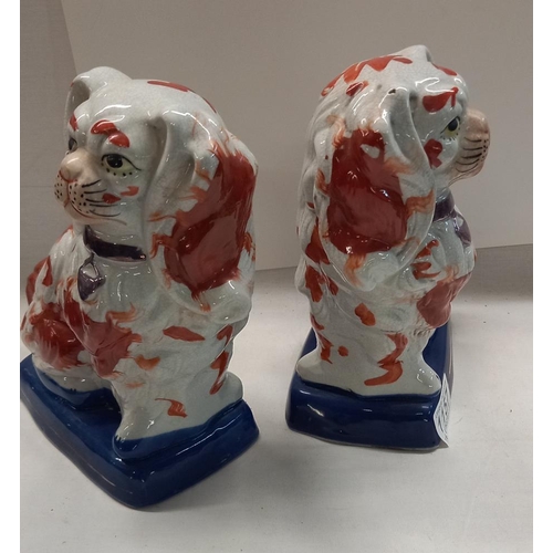 1157 - A pair of modern Victorian style Staffordshire spaniels