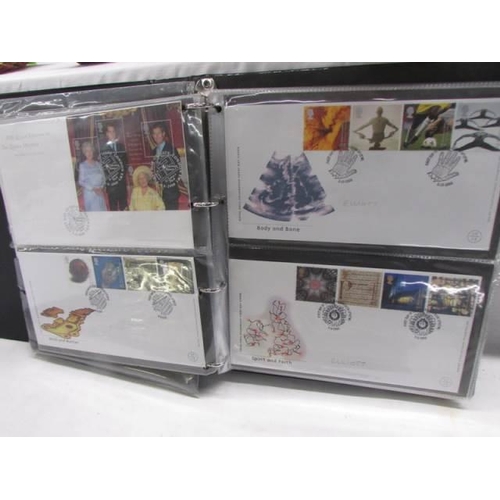 1196 - Two albums of first day covers.