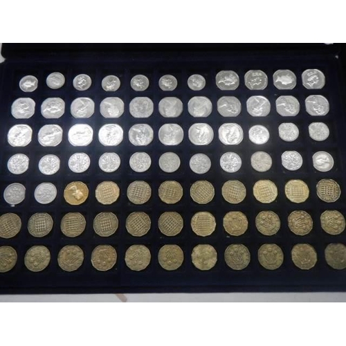 1112 - Four trays of assorted coins.