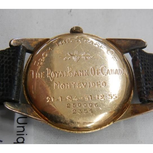 1024 - A Vulcan watch Co., Geneve 18ct gold cover gents watch from staff of Royal Bank of Canada Montevideo... 