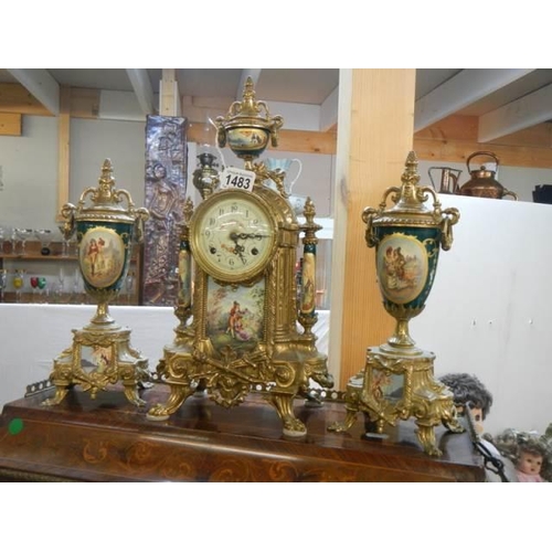 1483 - A superb three piece clock garniture with sevres panes, in working order, with key COLLECT ONLY.