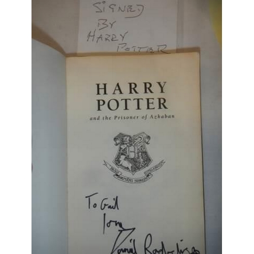 1190L - A copy of Harry Potter and the Prisoner of Askaban signed by Daniel Radcliffe.