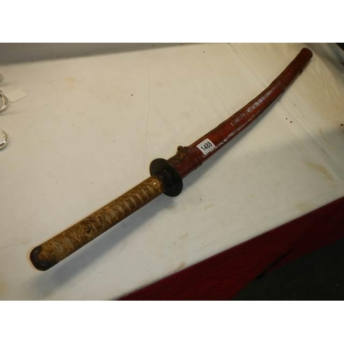 1488 - A Japanese Officers Katana sword  with shagreen hilt and leather scabbard, no marking on hilt, in go... 