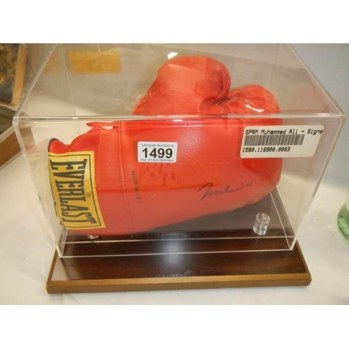 1499 - A cased signed Mohamed Ali boxing glove, COLLECT ONLY.