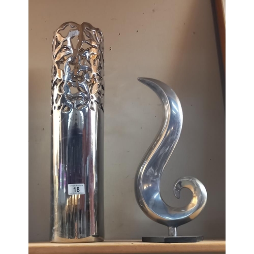 18 - A chrome pottery umbrella stand with pierced decoration and a modern art sculpture made of aluminium... 