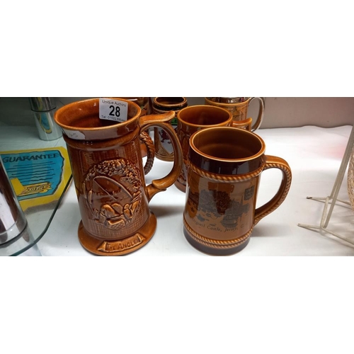 28 - A quantity of assorted tankards