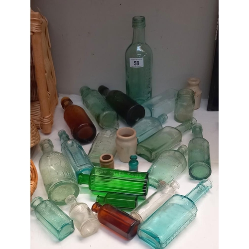 58 - A quantity of 19/20c vintage glass bottles including green poison etc