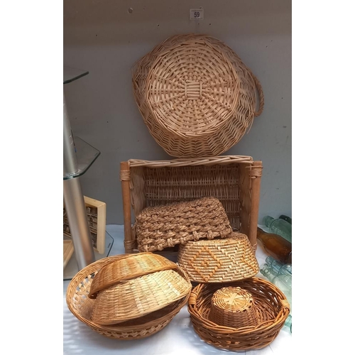 59 - A selection of wicker baskets COLLECT ONLY