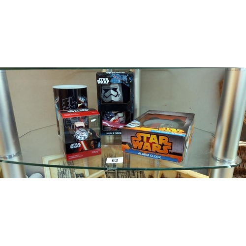 62 - New Star Wars boxed alarm clock, wrist watch, mug and sock set etc