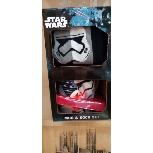 62 - New Star Wars boxed alarm clock, wrist watch, mug and sock set etc