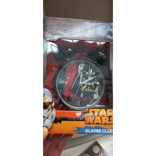 62 - New Star Wars boxed alarm clock, wrist watch, mug and sock set etc