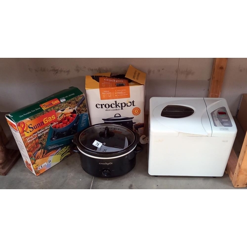 78 - A bread maker, crock pot and portable gas stove