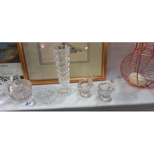 87 - A good lot of glass posy holders, vases, penny licks etc