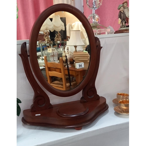 94 - An oval Victorian mahogany toilet mirror, COLLECT ONLY