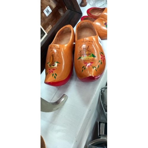 99 - A pair of hand painted vintage Holland Dutch wooden clogs