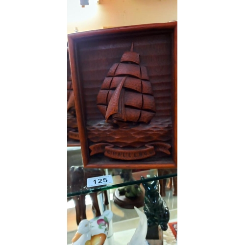 125 - A pair of wooden carved sailing ship design bookends