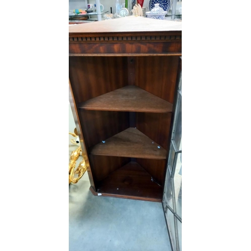 130 - A mahogany astragal glazed corner cabinet. COLLECT ONLY