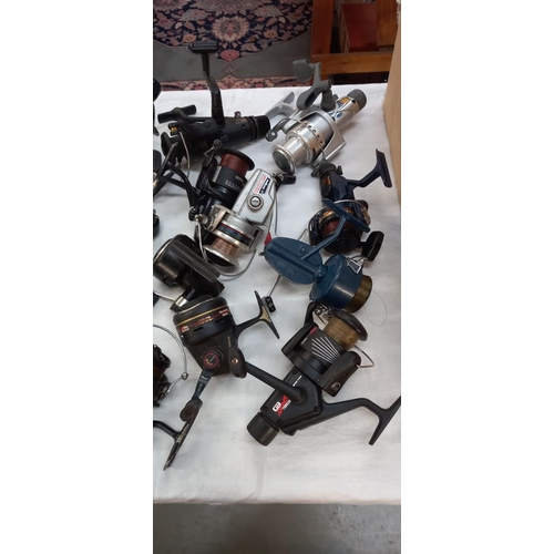 152 - A good lot of fishing rods and fishing reels COLLECT ONLY