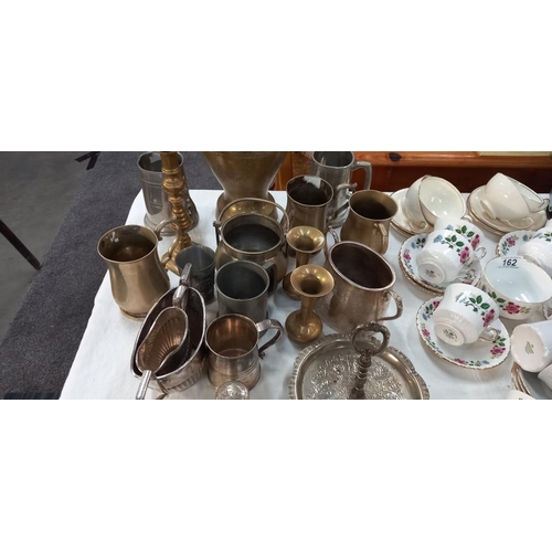 163 - A quantity of brass and pewter etc