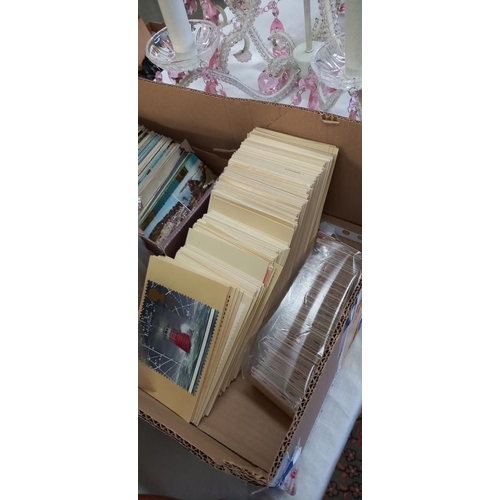 188 - A box of postcards, stamp postcards and bus tickets