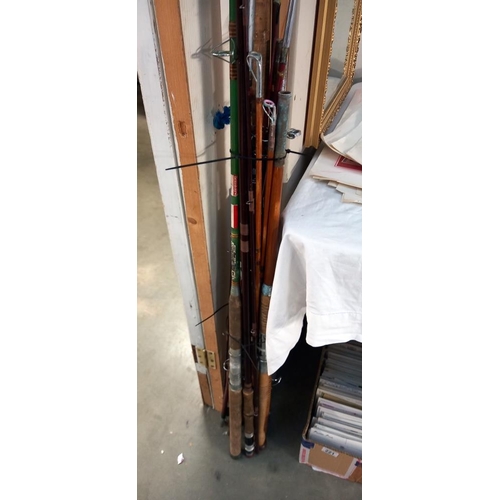 203 - A quantity of fishing rods, COLLECT ONLY