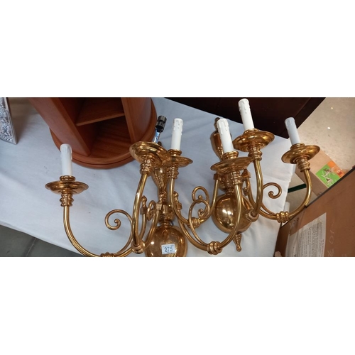 275 - Four good quality matching double brass wall lights