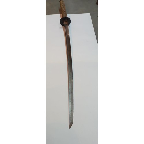 1488 - A Japanese Officers Katana sword  with shagreen hilt and leather scabbard, no marking on hilt, in go... 