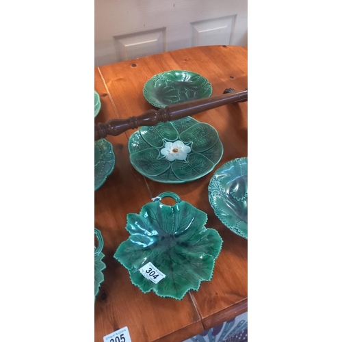 304 - A quantity of vintage green ceramic plates