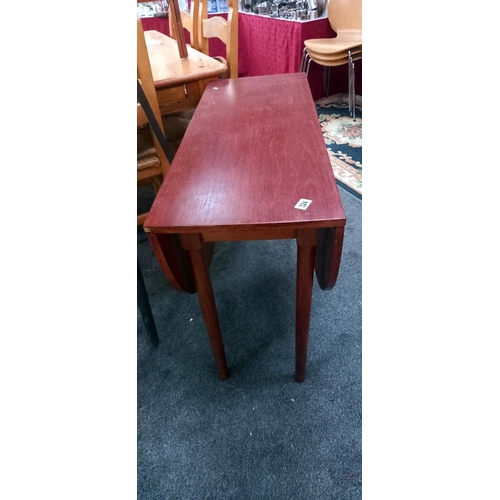 324 - A drop leaf table, COLLECT ONLY