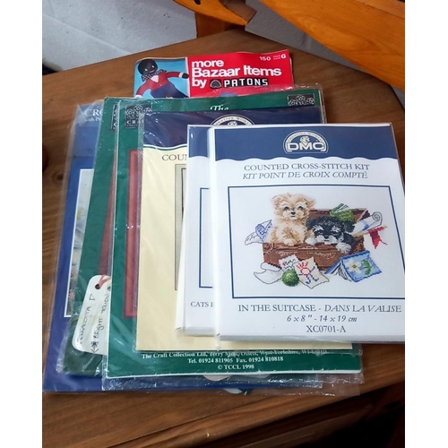 1272 - A sewing box of contents & a quantity of new cross stitch packs