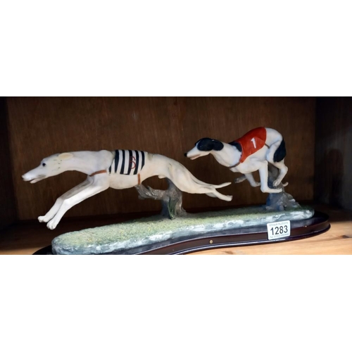 1283 - A figure of racing greyhounds COLLECT ONLY