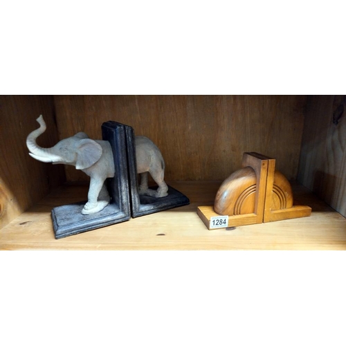 1284 - A set of elephant bookends & 1 other