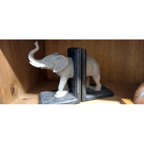 1284 - A set of elephant bookends & 1 other