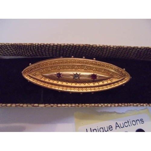 1028 - A 19th century ruby and diamond set brooch hall marked for Chester, 4.3 grams.