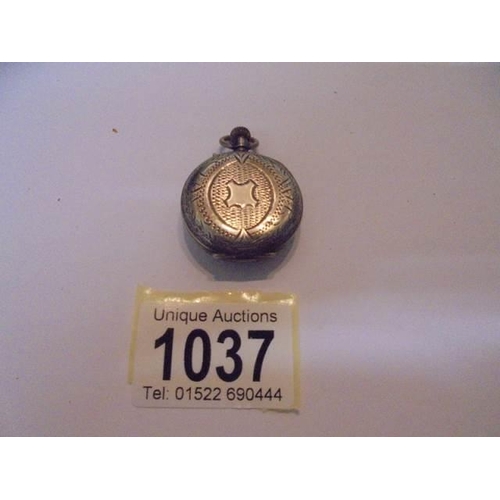 1037 - A silver stamped 800 enamel dial fob watch.