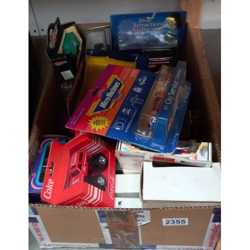 2355 - A large box of mixed, boxed diecast including Disney fire truck, Micro machines, set no7 City servic... 