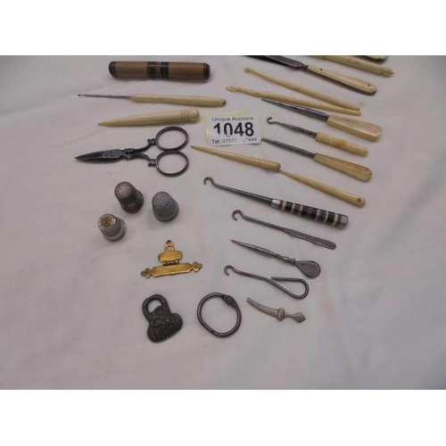 1048 - A mixed lot of sewing and manicure tools.