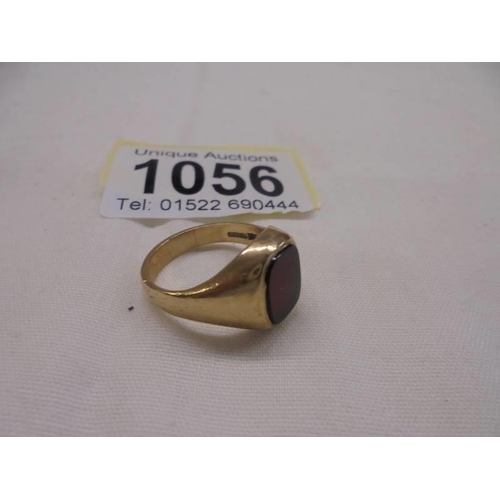 1056 - A 9ct gold gents ring, size N, 5.4 grams.