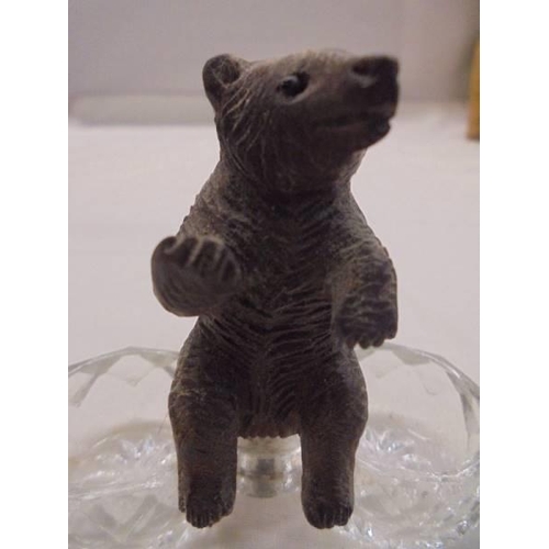 1059 - A Black Forest bear on glass salts.