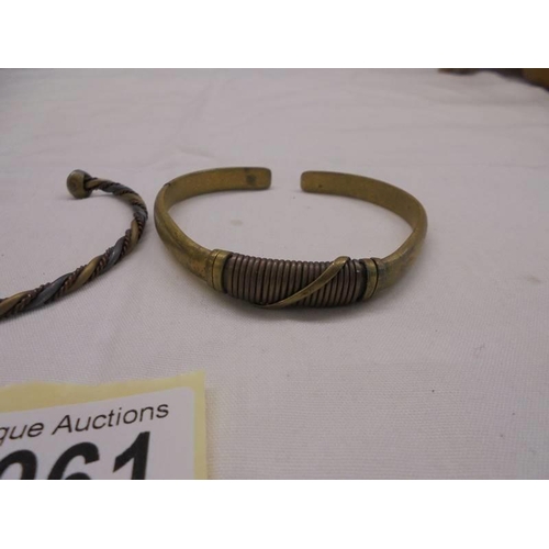 1061 - Two old slave bracelets.