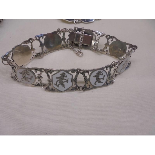 1062 - A good lot of silver bracelets, pendant etc.,